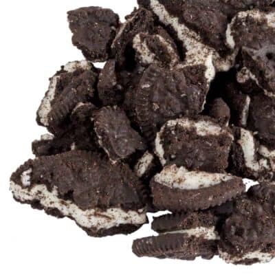 Pile of cookies and cream pieces on a white background